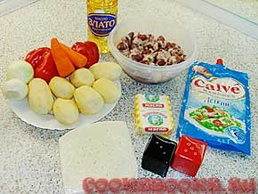 Картофельная запеканка с куриными сердцами, грибами и овощами