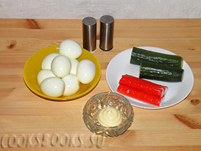 Яйца фаршированные с огурцом и крабовыми палочками